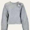 Edited "Xezal" Sweater - mit Brosche